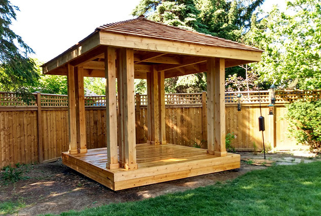 Custom wood gazebo in backyard